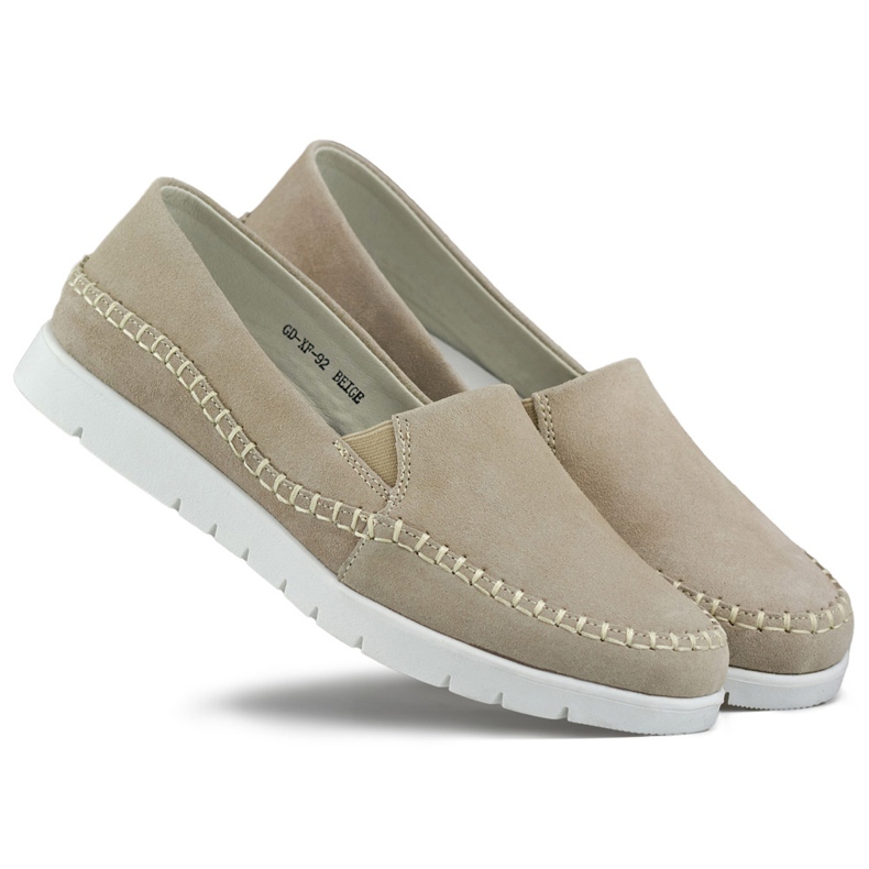 Comfortable women's shoes made of natural leather with a flat sole beige
