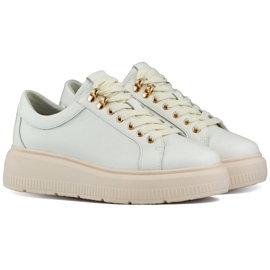 Beige leather women's shoes with laces on the platform