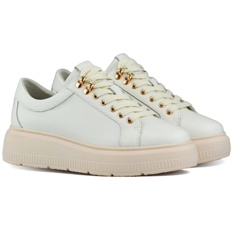 Beige leather women's shoes with laces on the platform
