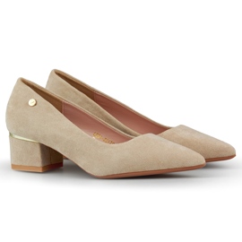 Beige pumps with low heels