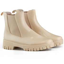 Beige women's Wellington boots with a thick sole