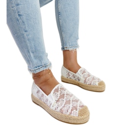 Sonali's white lace platform espadrilles