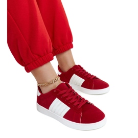 Red suede sneakers on the Serap platform