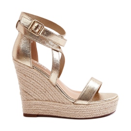 Wedge sandals with golden Salthe braid
