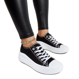 Black sneakers on a thick Zlata platform Black sneakers on a thick Zlata platform