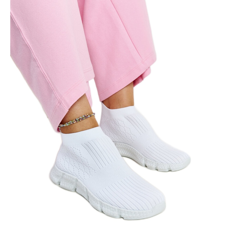 White lightweight sports sneakers by Vaclav
