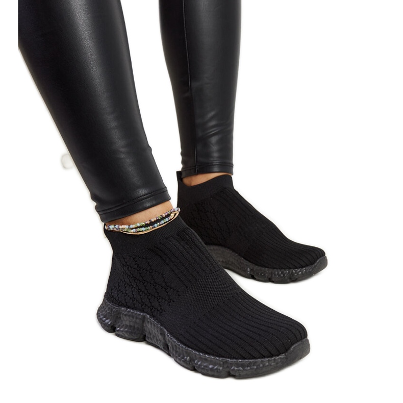 Black lightweight sports sneakers by Vaclav