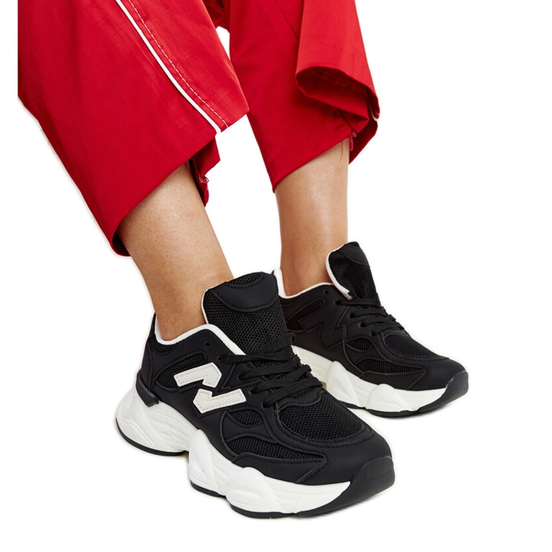 Black sneakers with a massive Gergely sole Black sneakers with a massive Gergely sole