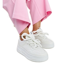 White sneakers with a high Lengyel platform
