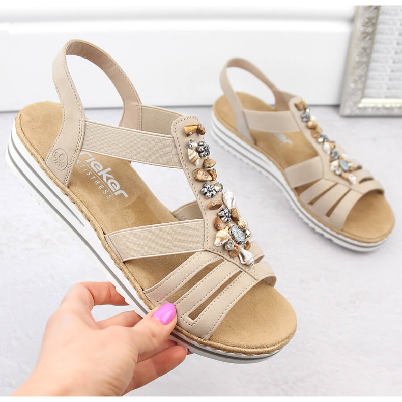 Comfortable women's slip-on sandals with elastic bands, beige Rieker V0649-62