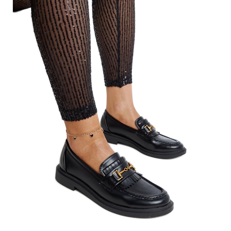 Black loafers with a Laurel buckle