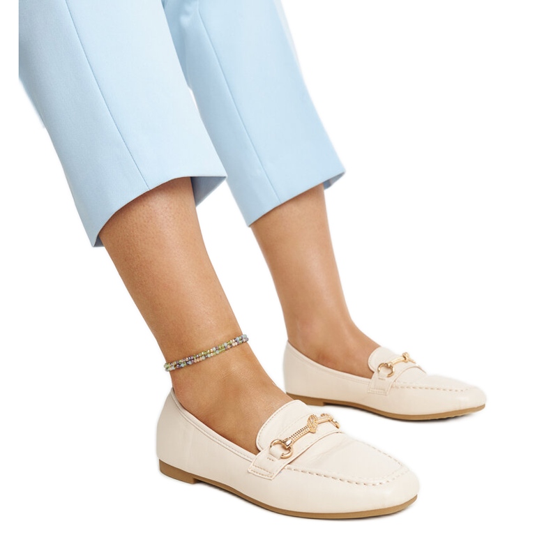 Light beige decorative moccasins by Docherty
