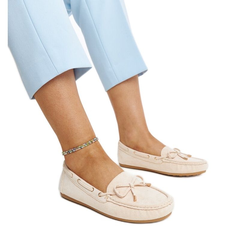 Light beige suede loafers by Aneesa
