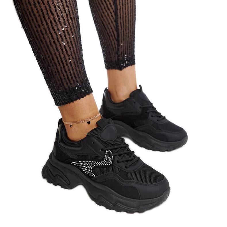Black platform sneakers decorated with Maras rhinestones