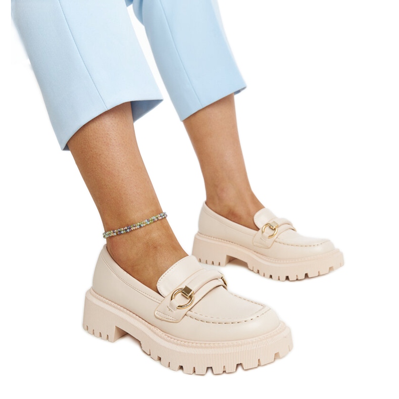 Beige loafers with a Lasima buckle