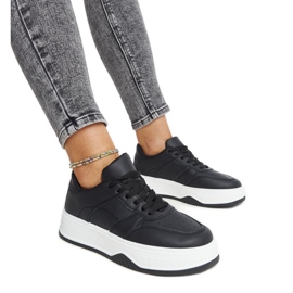 Black sneakers with a thick Rafida sole