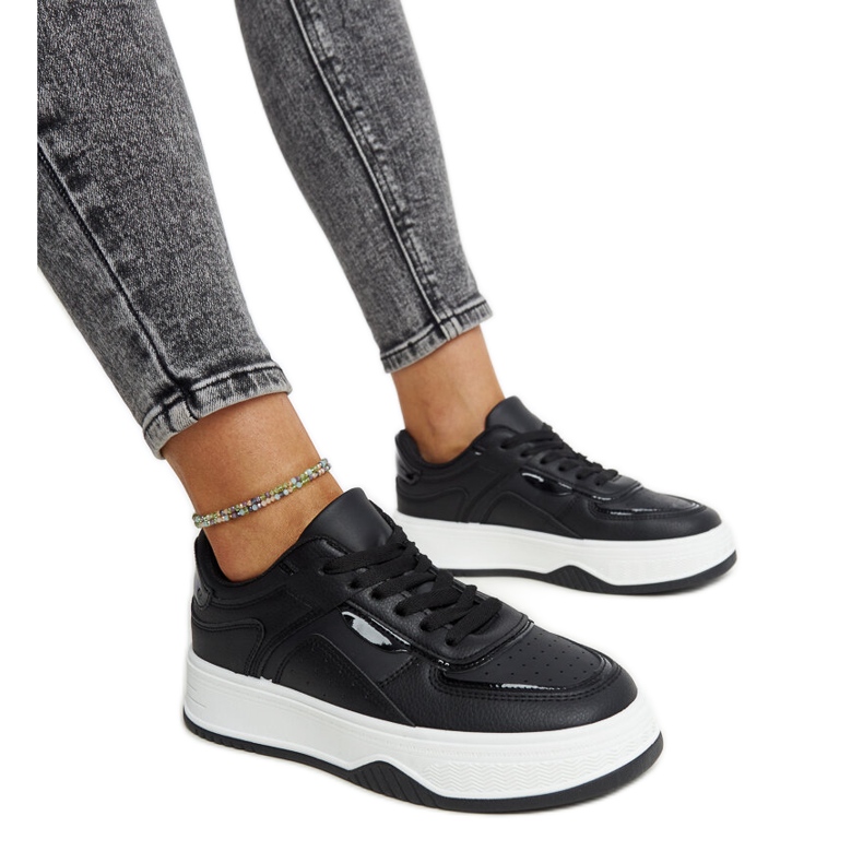Black sneakers with a thicker Intis sole