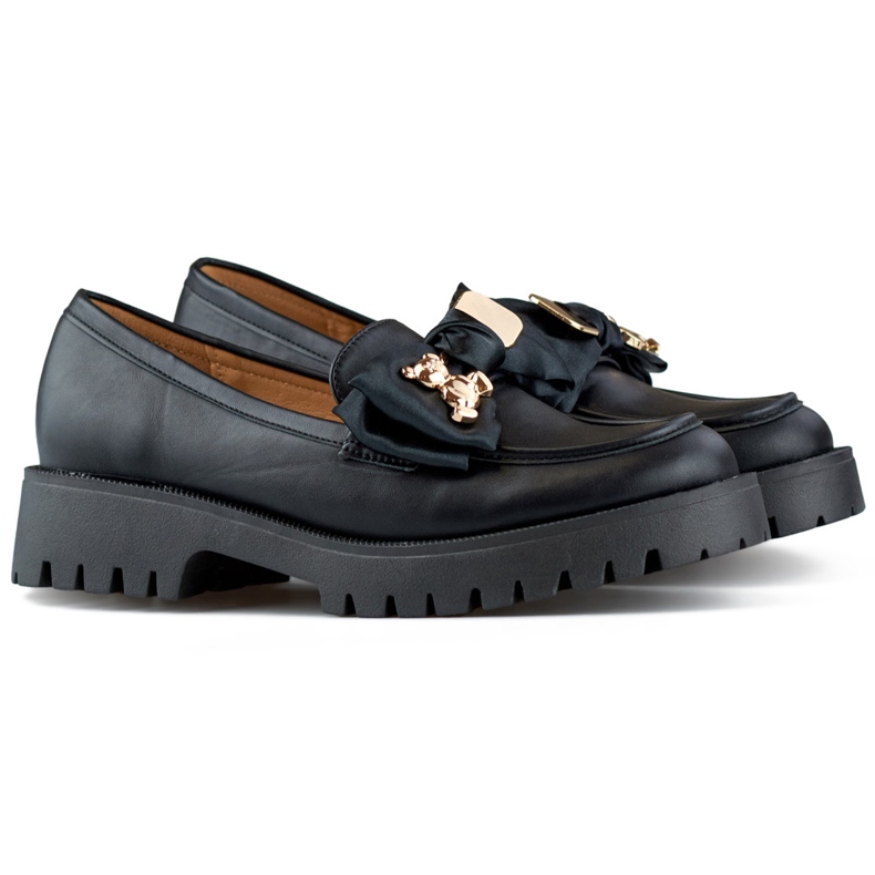 Black loafers with a bow, moccasins with a teddy bear