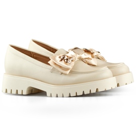 Beige loafers with a bow, moccasins with a teddy bear