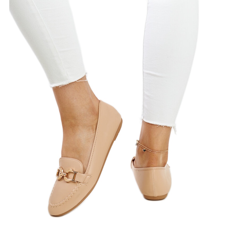 Beige moccasins with a Najla buckle