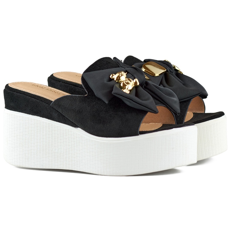 Black women's slippers with a teddy bear and a bow on the wedge