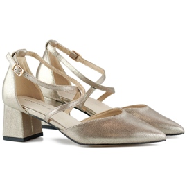 Silver pumps with straps on a low heel