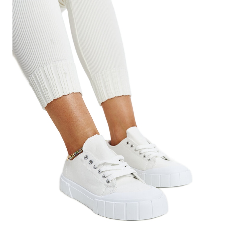 Eduard's white fabric sneakers