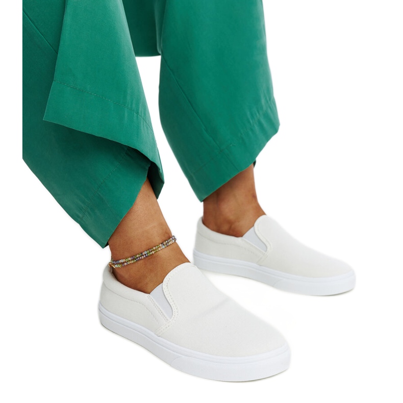 White fabric sneakers by Suraya