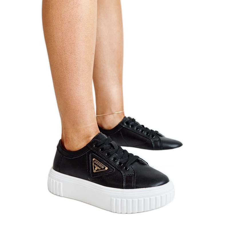 Black leather shoes with a decorative buckle