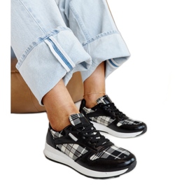 Black leather shoes with a decorative buckle