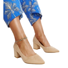 Beige high-heeled pumps with a Paris leather insert