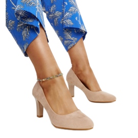 Beige high-heeled pumps with a leather insert from Lalande