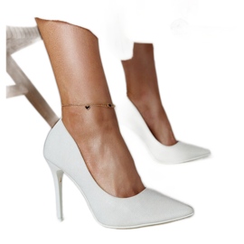 White shiny high heels with a leather insert by Cortesa