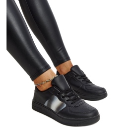 Black leather shoes with a decorative buckle