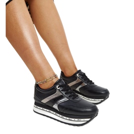 Black leather shoes with a decorative buckle