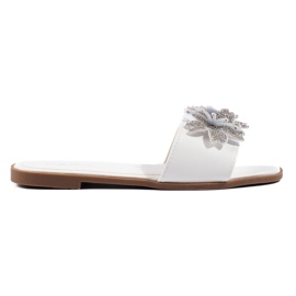White women's flip-flops with decoration