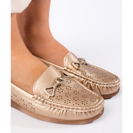 Women's gold moccasins golden