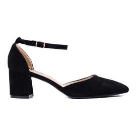 Women's black suede pumps