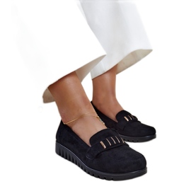 Black moccasins with a decorative stripe by Marlisa
