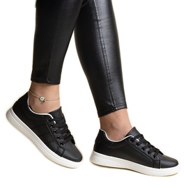 White eco-leather sneakers by Cathleen White eco-leather sneakers by Cathleen