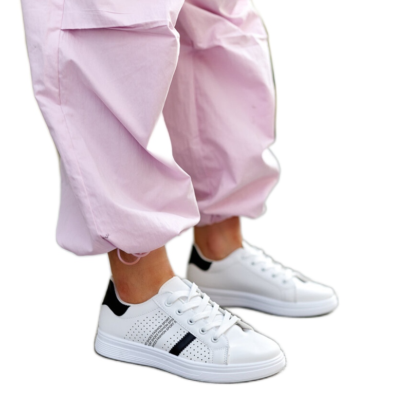White and black eco leather sneakers by Berdine