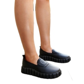 Black shoes with a massive Teska sole