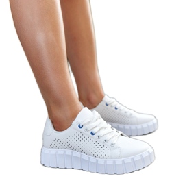 White sneakers with a massive Nesibe sole