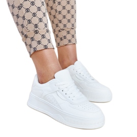 White sneakers with a thicker Intis sole