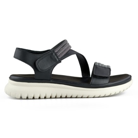 Comfortable black women's sandals with elastic band and Velcro fastening Comfortable black women's sandals with elastic band and Velcro fastening