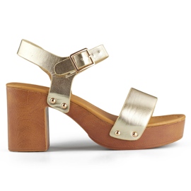 Gold sandals with a wooden platform heel golden Gold sandals with a wooden platform heel golden