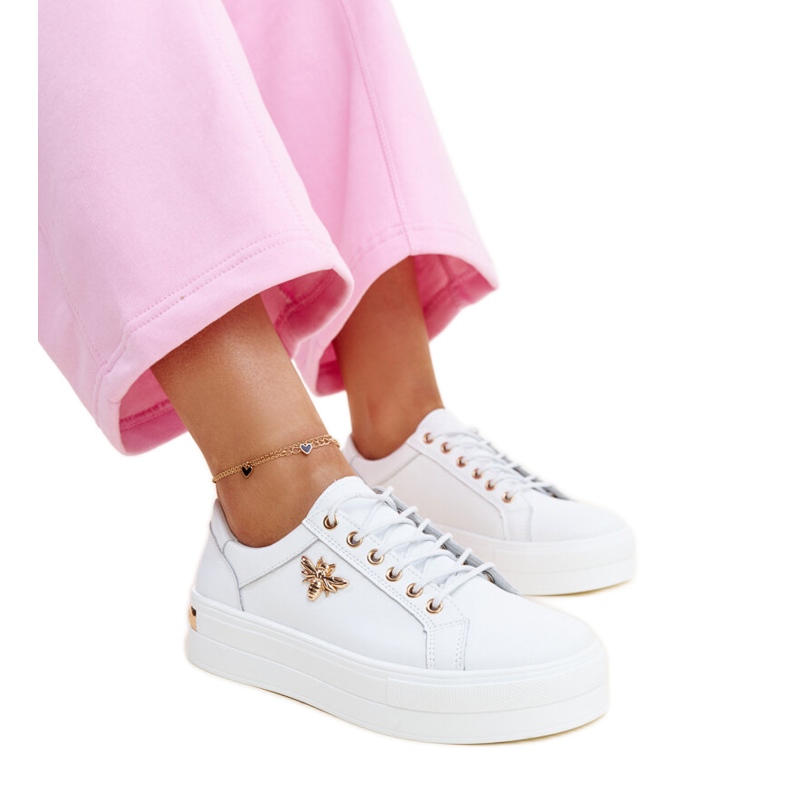 White leather sneakers with a thick Mikka sole