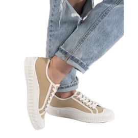 Dark beige women's sneakers on the platform Dark beige women's sneakers on the platform