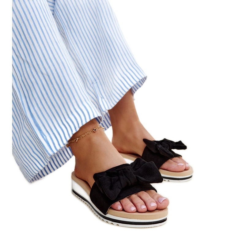 Mikhail's black low wedge mules