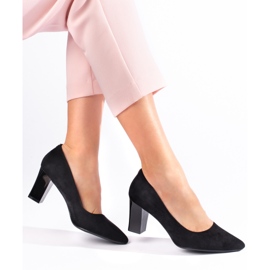 Women's black high-heeled pumps by Sergio Leone